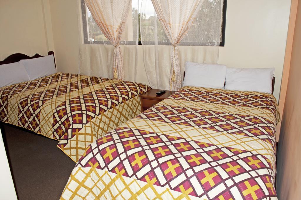 Hotel Residencial El Viajero Tababela Pokoj fotografie